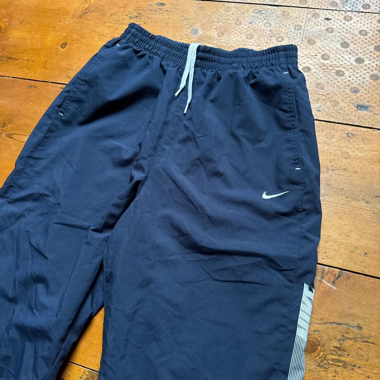 Nike Navy Spell Out Tracksuit Bottoms