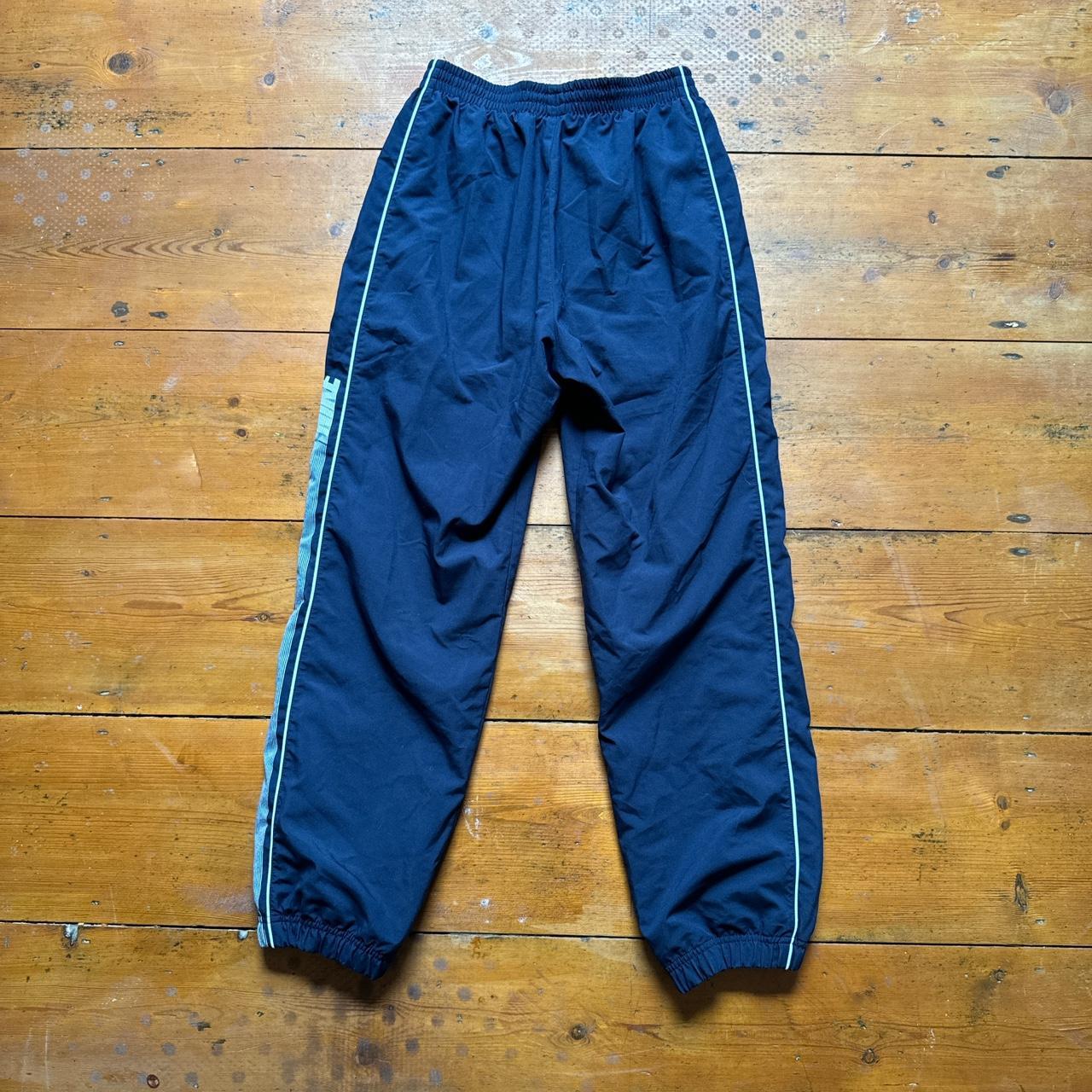 Nike Navy Spell Out Tracksuit Bottoms