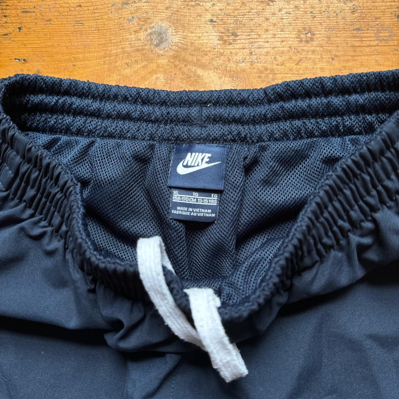 Nike Navy Spell Out Tracksuit Bottoms