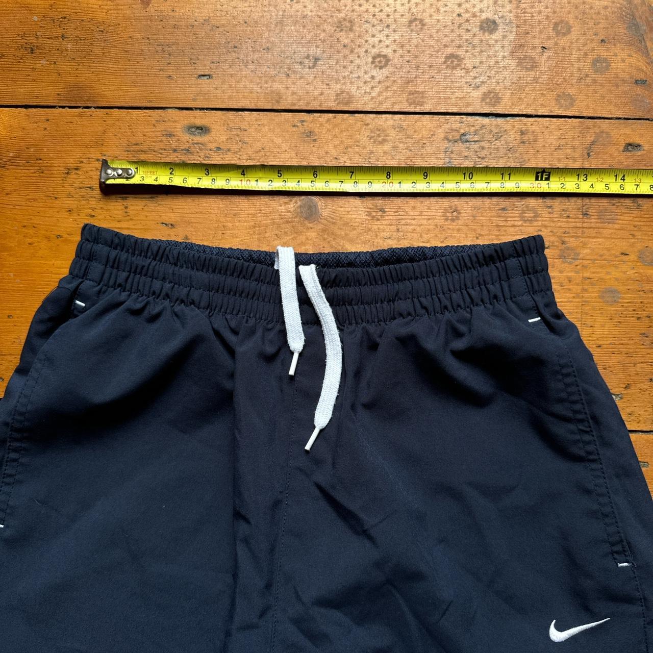 Nike Navy Spell Out Tracksuit Bottoms