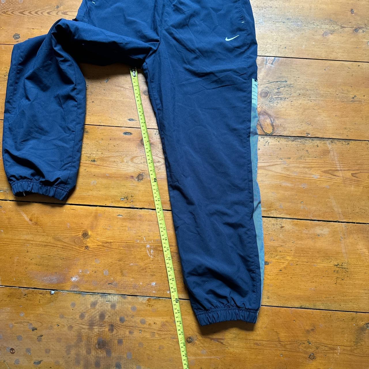 Nike Navy Spell Out Tracksuit Bottoms